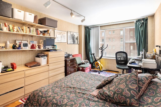 77 W 55th St Unit 7F, New York City, NY 10019 - bedroom featuring track lighting
