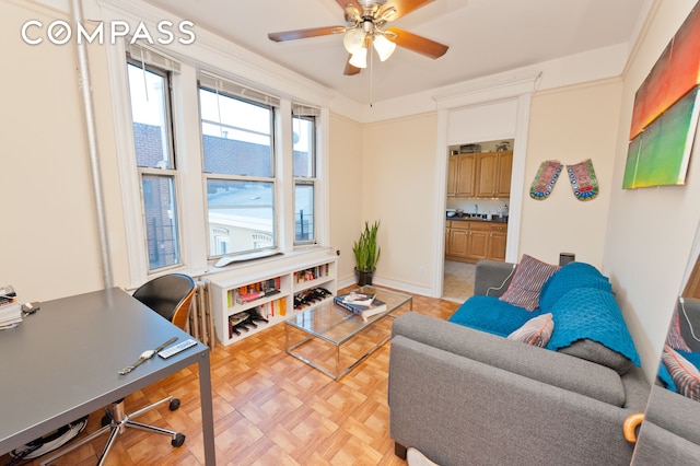 25-21 23rd St Unit 24, New York City, NY 11102 - living room with ceiling fan and a desk