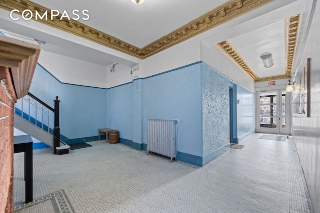 25-21 23rd St Unit 24, New York City, NY 11102 - building lobby featuring crown molding and stairs