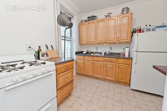 25-21 23rd St Unit 24, New York City, NY 11102 - kitchen featuring white appliances, ornamental molding, dark countertops, a sink, and light tile patterned floors