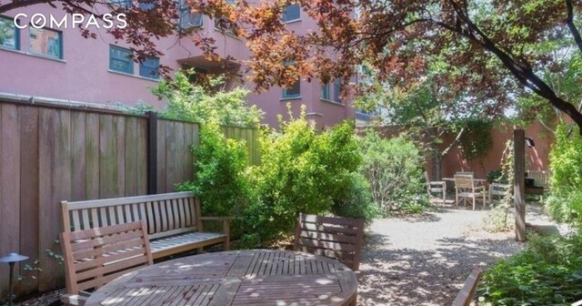 569 Carroll St Unit 9, New York City, NY 11215 - view of home's community with outdoor dining area, a fenced backyard, and a patio area
