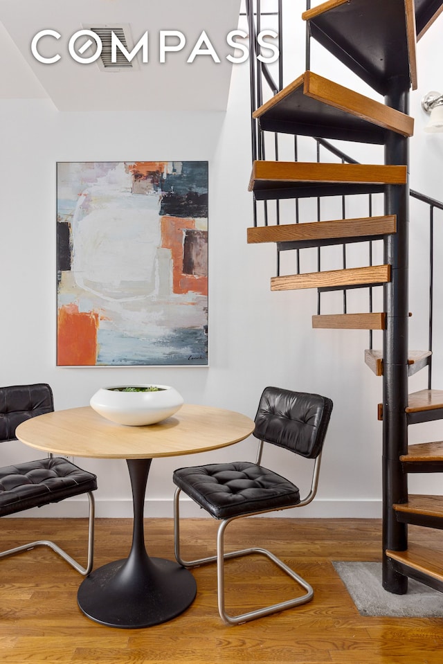 569 Carroll St Unit 9, New York City, NY 11215 - dining space with wood finished floors, stairs, and baseboards