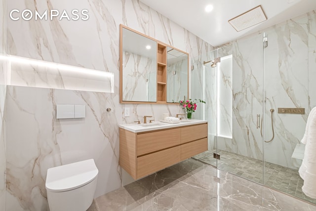 420 E 75th St Unit 3, New York City, NY 10021 - full bath featuring marble tiled flooring, a marble finish shower, toilet, double vanity, and tile walls