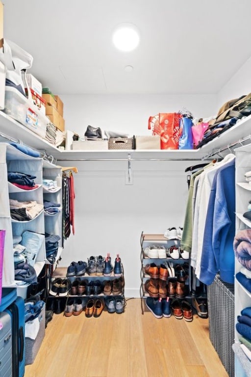 21-30 44th Dr Unit 7C, New York City, NY 11101 - walk in closet with wood finished floors