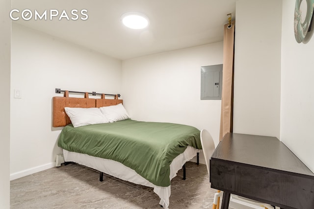 212 E 70th St Unit B, New York City, NY 10021 - bedroom featuring electric panel and baseboards