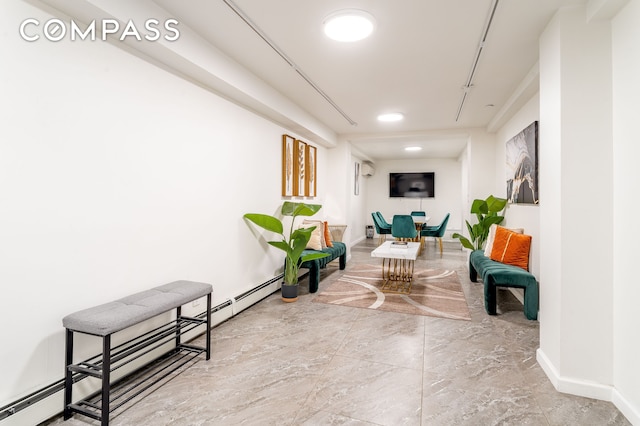 212 E 70th St Unit B, New York City, NY 10021 - hallway featuring marble finish floors and baseboards