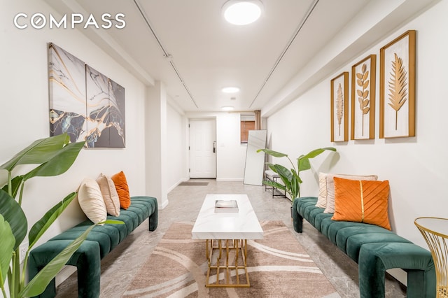 212 E 70th St Unit B, New York City, NY 10021 - living area featuring baseboards