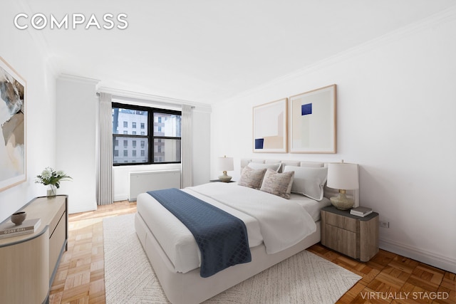200 E 27th St Unit 2V, New York City, NY 10016 - bedroom featuring radiator and ornamental molding