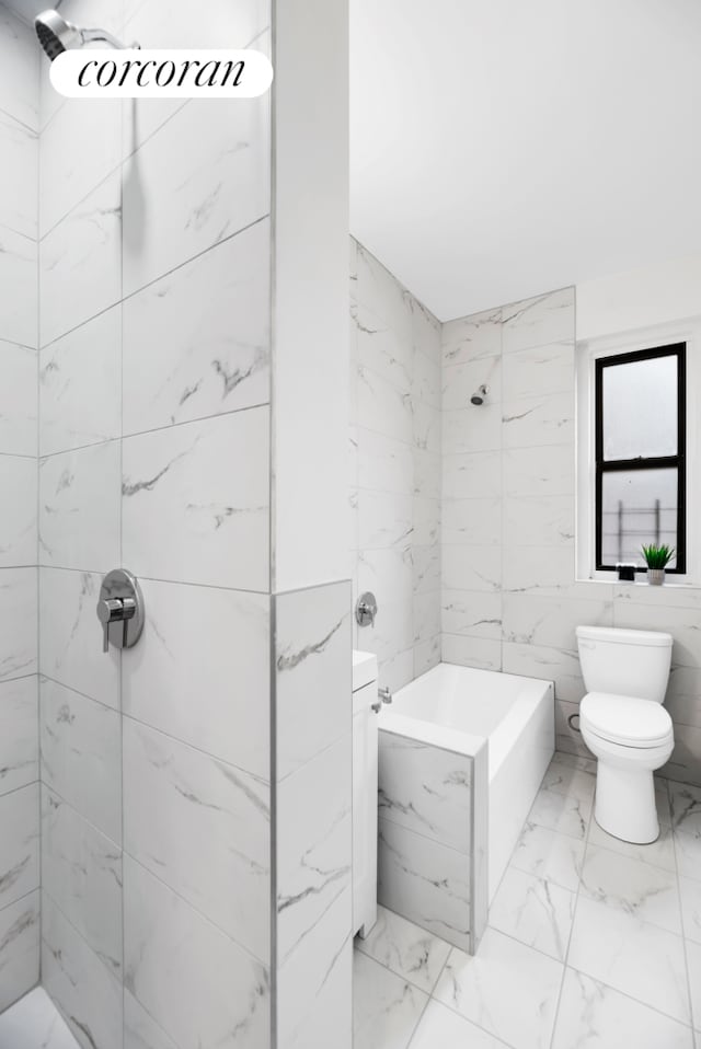 3000 Valentine Ave Unit 2B, New York City, NY 10458 - bathroom featuring marble finish floors, a shower, toilet, tile walls, and a bathtub