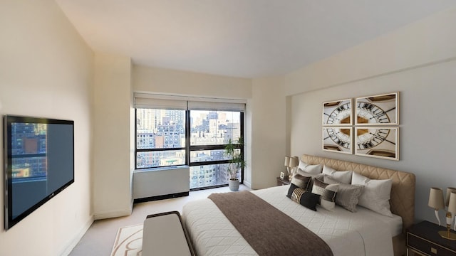 415 E 54th St Unit 19-G, New York City, NY 10022 - bedroom featuring light colored carpet