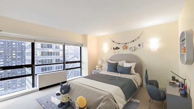 415 E 54th St Unit 19-G, New York City, NY 10022 - bedroom featuring carpet flooring