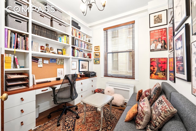 50 W 67th St Unit 4F, New York City, NY 10023 - office with built in study area, a chandelier, wood finished floors, and a wall mounted air conditioner