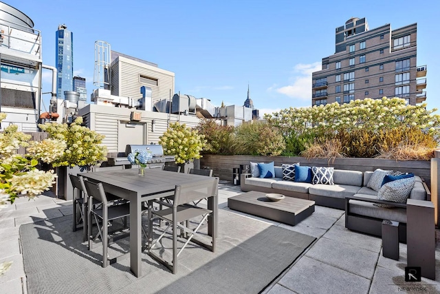 160 E 22nd St Unit 18-A, New York City, NY 10010 - view of patio / terrace with outdoor lounge area, outdoor dining area, a grill, and a city view