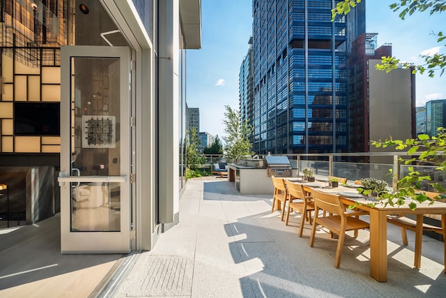 1 City Pt Unit 59E, New York City, NY 11201 - view of patio with a city view and outdoor dining space