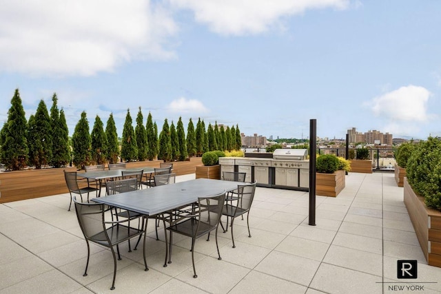 2100 Bedford Ave Unit 7-A, New York City, NY 11226 - view of patio / terrace with outdoor dining space and a view of city