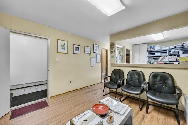 2256 Hendrickson St Unit P1, New York City, NY 11234 - living area with a baseboard heating unit and light wood-type flooring
