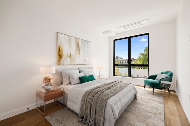 78 Harman St Unit 2-F, New York City, NY 11221 - bedroom featuring wood finished floors