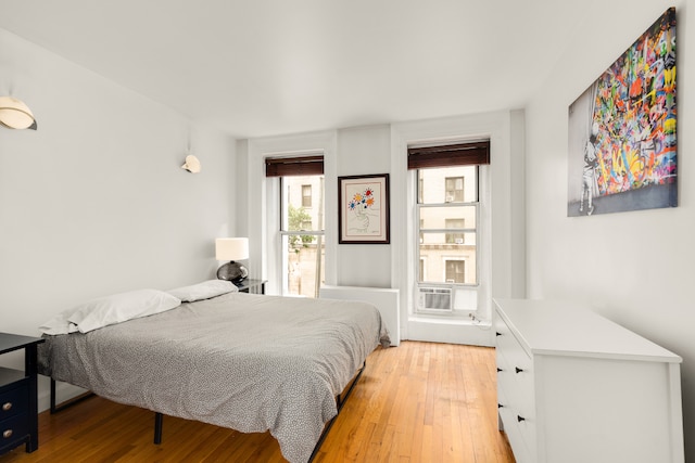 206 E 35th St Unit Th, New York City, NY 10016 - bedroom featuring light wood-style floors