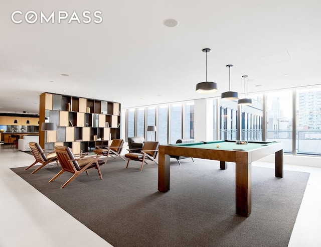 242 Broome St Unit 7D, New York City, NY 10002 - playroom with billiards table and carpet