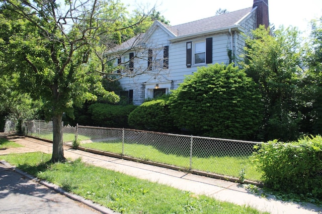 199-20 100th Ave, New York City, NY 11423 - view of property exterior featuring a chimney