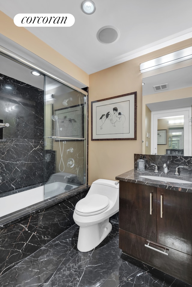 280 Park Ave S Unit 18Ef, New York City, NY 10010 - full bathroom featuring marble tiled floors, vanity, toilet, and a combined bath / shower with marble appearance