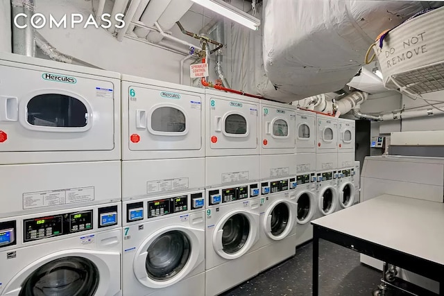 153 E 57th St Unit 17F, New York City, NY 10022 - community laundry room with stacked washer and clothes dryer and washer and dryer