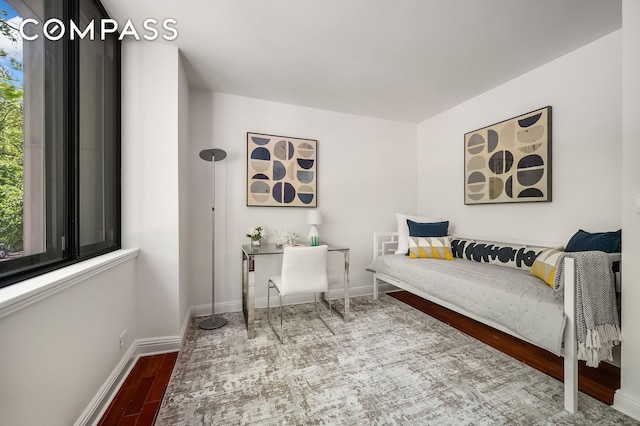 386 Columbus Ave Unit 2A, New York City, NY 10024 - bedroom with wood finished floors and baseboards