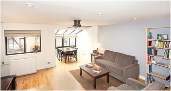 225 E 86th St Unit 304, New York City, NY 10028 - living area with wood finished floors, ceiling fan, and recessed lighting