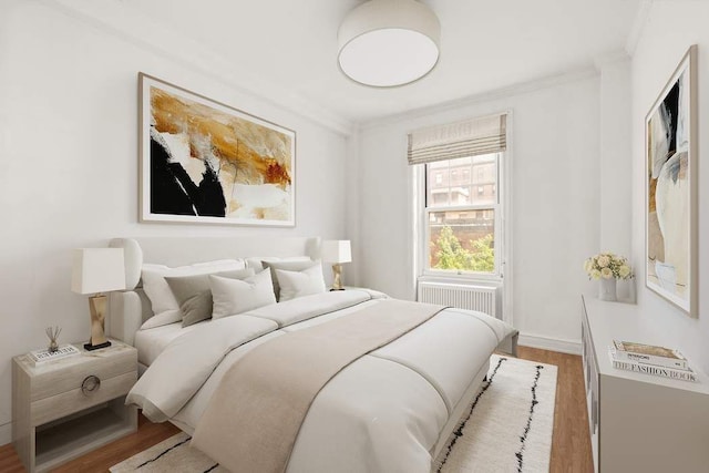 150 E 72nd St Unit 6S, New York City, NY 10021 - bedroom featuring ornamental molding and wood finished floors