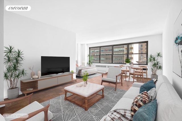 205 W End Ave Unit 9R, New York City, NY 10023 - living area with radiator and wood finished floors