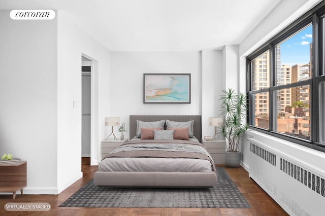205 W End Ave Unit 9R, New York City, NY 10023 - bedroom with radiator and baseboards