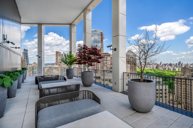 15 W 61st St Unit 12G, New York City, NY 10023 - view of patio featuring a skyline view and a balcony