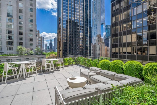 15 W 61st St Unit 12G, New York City, NY 10023 - view of patio featuring a skyline view