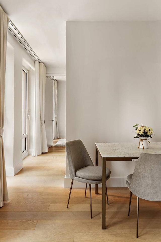 15 W 61st St Unit 12G, New York City, NY 10023 - dining space with light wood-type flooring