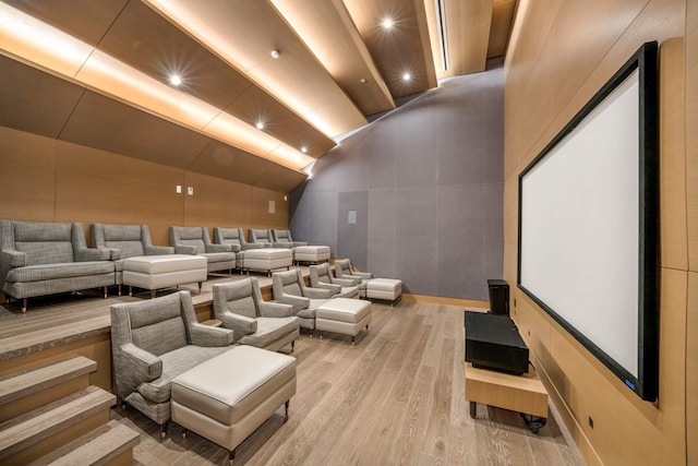 15 W 61st St Unit 12G, New York City, NY 10023 - cinema with light wood-style floors and lofted ceiling