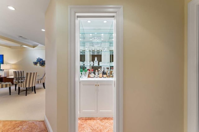575 Park Ave Unit 507, New York City, NY 10065 - corridor featuring light tile patterned floors, light carpet, recessed lighting, and beamed ceiling