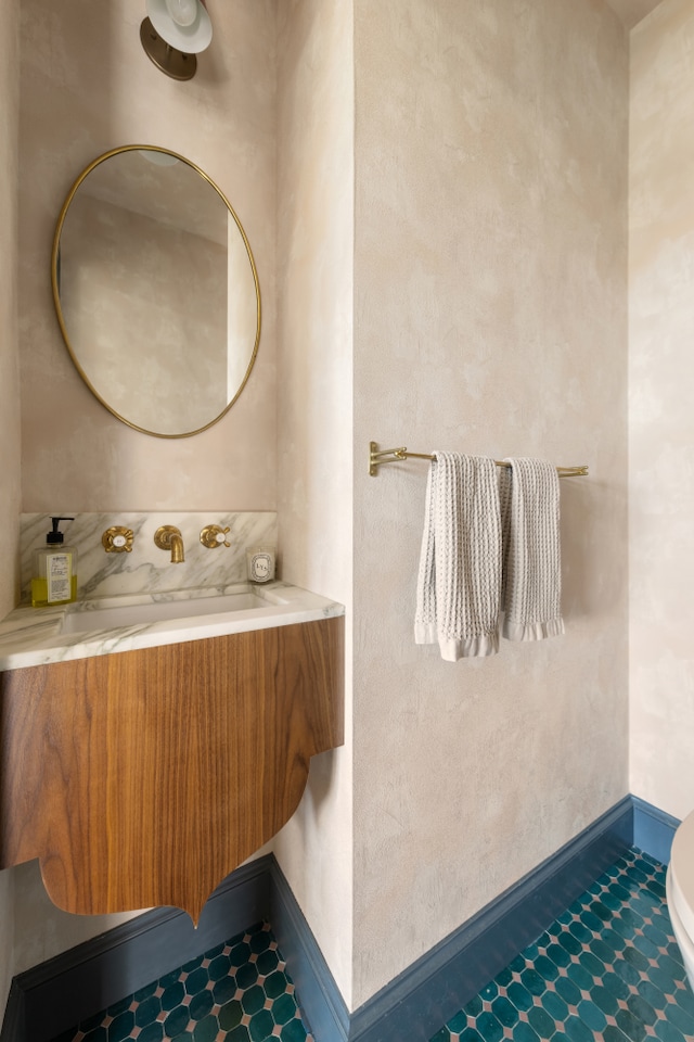 15 Jones St Unit 6A, New York City, NY 10014 - bathroom with toilet, vanity, and tile patterned floors
