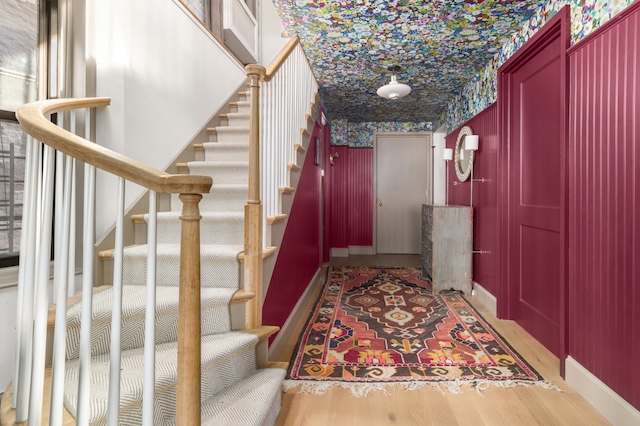 15 Jones St Unit 6A, New York City, NY 10014 - stairway featuring wallpapered walls and wood finished floors