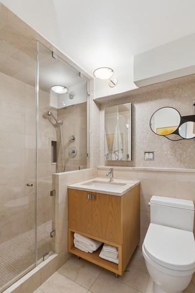 205 E 63rd St Unit 5H, New York City, NY 10065 - full bath featuring a shower stall, vanity, and toilet