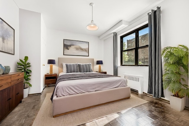 263 Bennett Ave Unit 1C, New York City, NY 10040 - bedroom with radiator heating unit and baseboards
