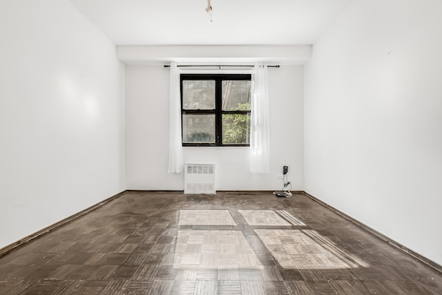 263 Bennett Ave Unit 1C, New York City, NY 10040 - unfurnished room with radiator heating unit and baseboards