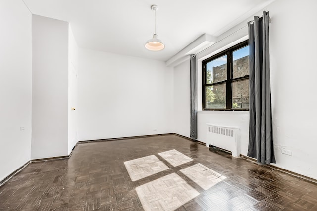 263 Bennett Ave Unit 1C, New York City, NY 10040 - unfurnished room with radiator and baseboards