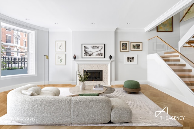303 W 80th St Unit 2B1B, New York City, NY 10024 - living area featuring baseboards, ornamental molding, stairway, and a high end fireplace