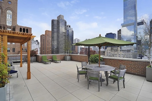 130 E 63rd St Unit 4E, New York City, NY 10065 - view of patio / terrace featuring a view of city and outdoor dining area