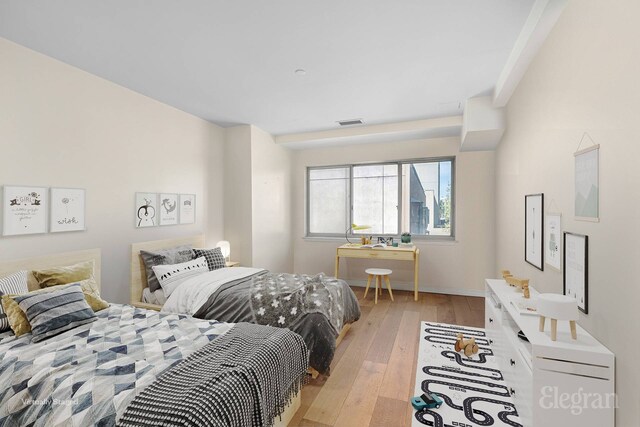 1400 5th Ave Unit 4G, New York City, NY 10026 - bedroom featuring light wood-style flooring