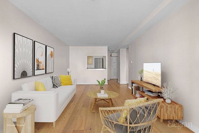 1400 5th Ave Unit 4G, New York City, NY 10026 - living area featuring light wood-type flooring and baseboards
