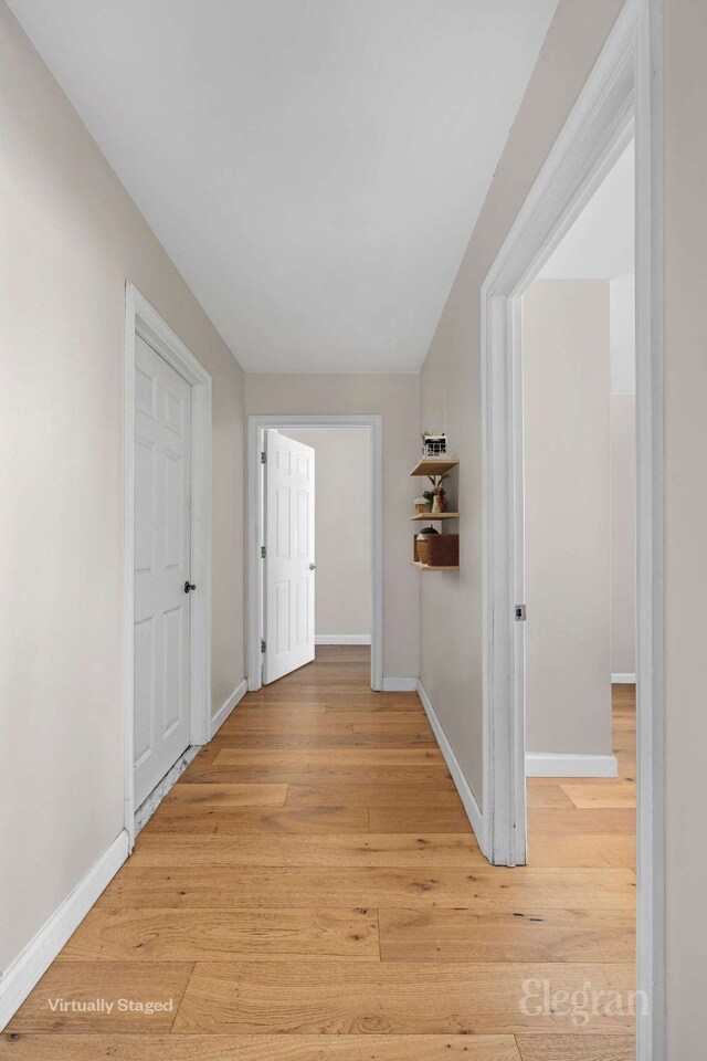 1400 5th Ave Unit 4G, New York City, NY 10026 - corridor with baseboards and light wood finished floors