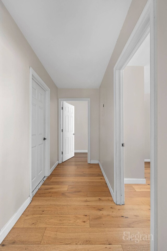 1400 5th Ave Unit 4G, New York City, NY 10026 - corridor featuring baseboards and light wood-style floors