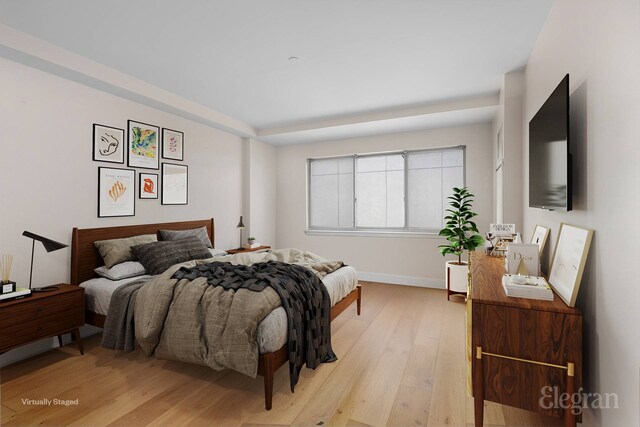 1400 5th Ave Unit 4G, New York City, NY 10026 - bedroom with light wood-style floors and baseboards