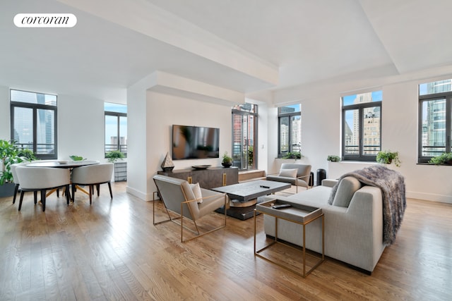 200 Rector Pl Unit 44D, New York City, NY 10280 - living room with wood finished floors and baseboards